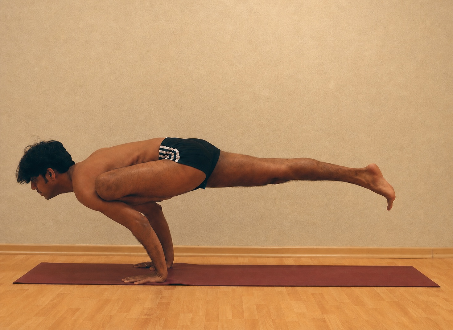 Eka Pada Koundinyasana yoga practice demonstrated by Pankaj Sharma